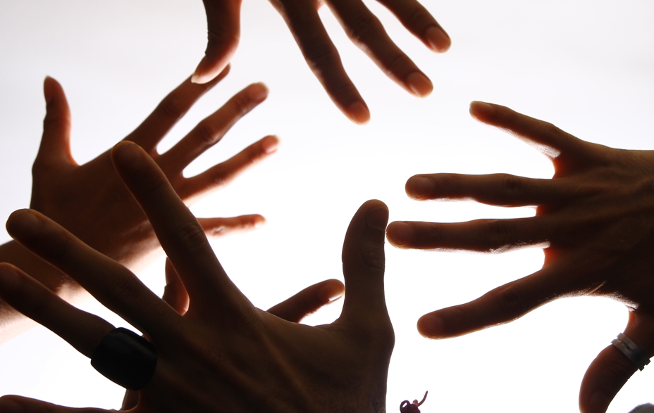 Billede af hænder, fællesskab